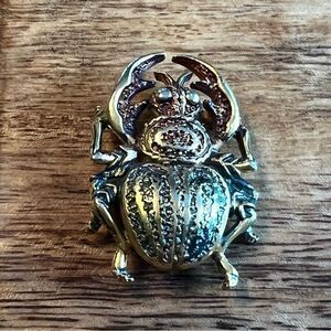 Gold toned scarab beetle pin brooch